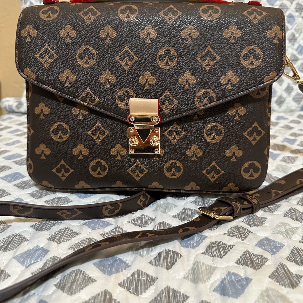BROWN PURSE ALMOST NEW